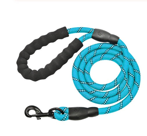 Blue dog leash with black handle and clip on a white background